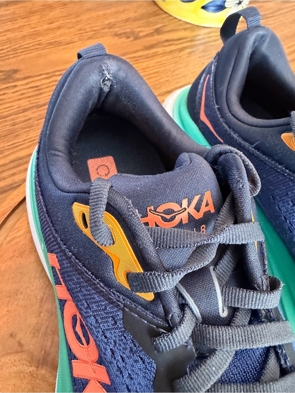 Hoka Navy Running Shoes with Teal Midsole and Orange Logo - Picture 7 of 9